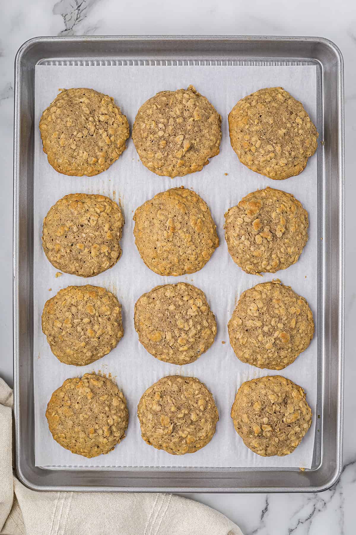 Baked banana cookies on baking sheet.