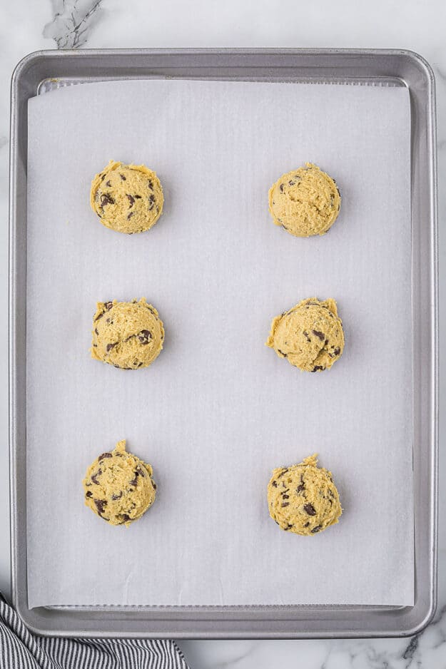 Cookie dough on baking sheet.