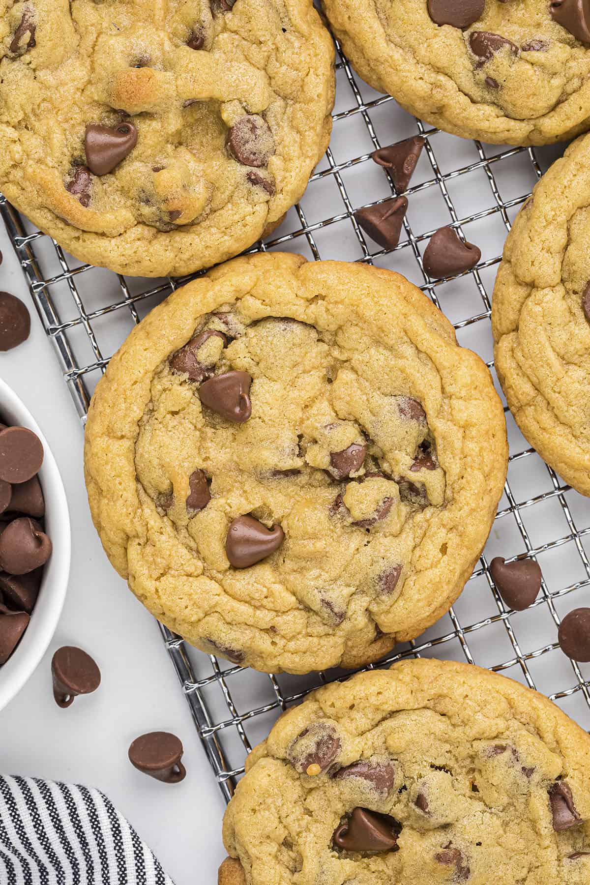 Chocolate chip pudding cookies on cooling rack.