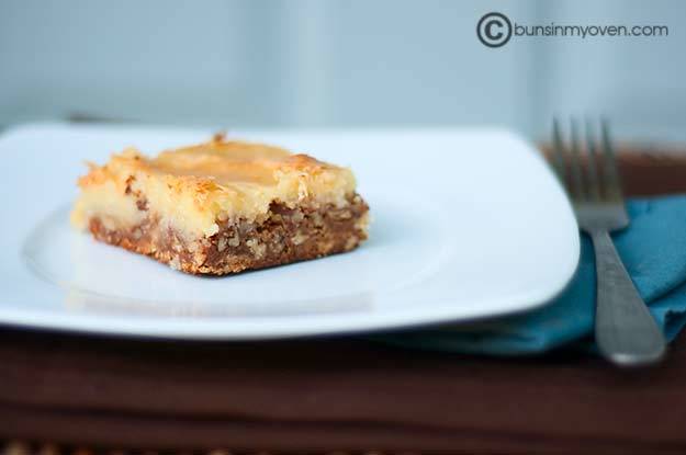 A butter pecan square on a square white plate