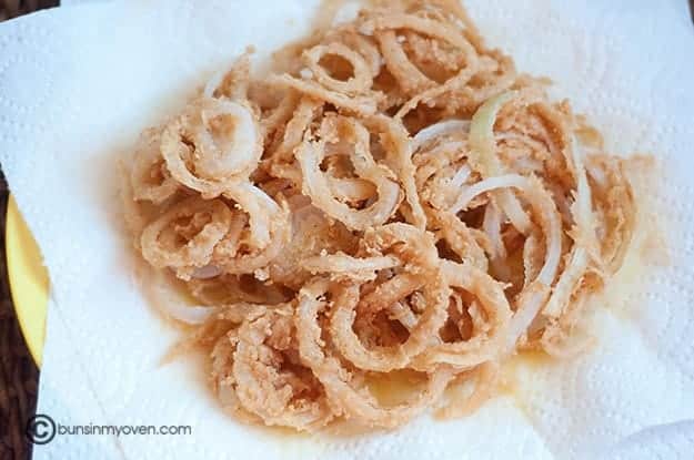 Overhead view of fried onion straws.
