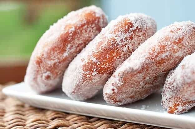 Sugar donuts don't get any better than these. This fried donut recipe shoves nutella all up inside!
