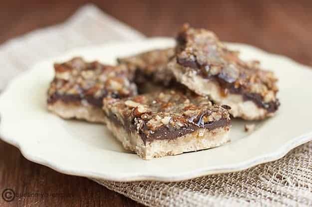 A close up several shortbread bars on a plate.