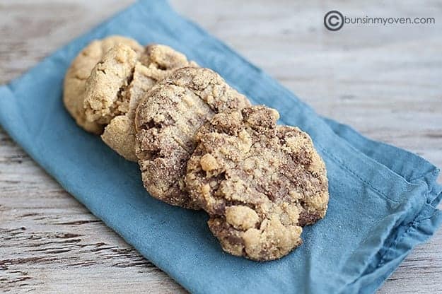 Three swirled Nutella cookies on a blue napkin