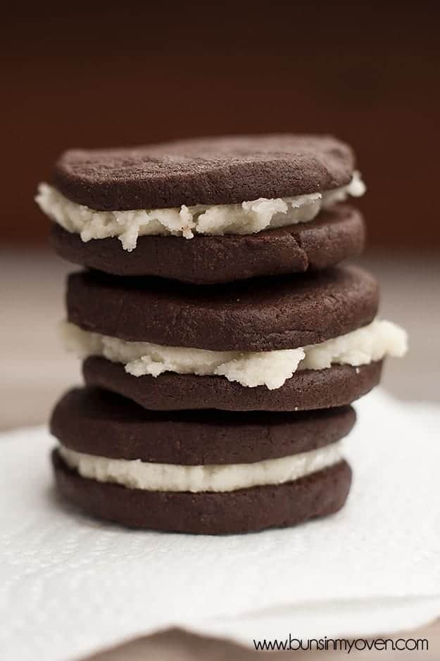 three stacked up chocolate sandwich cookies

