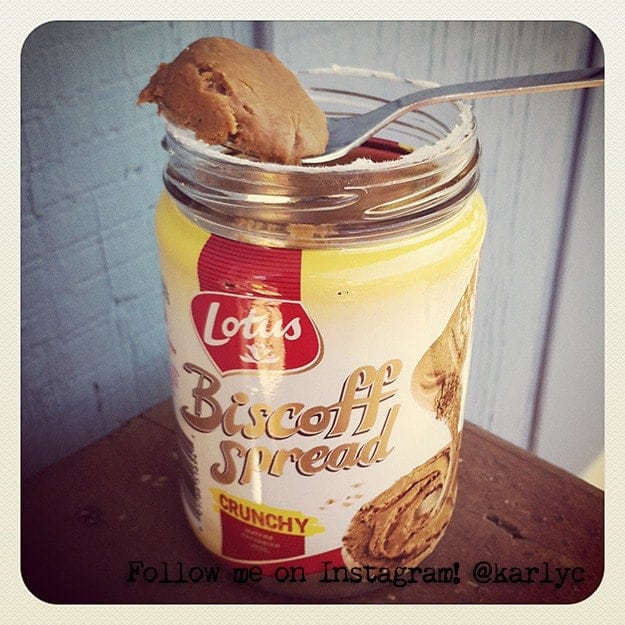 A spoon scooping out a serving of Biscoff spread.