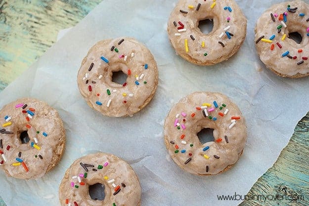 A overhead view of doughnuts topped with sprinkles