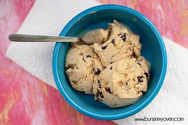 An overhead view of a bowl of ice cream with chocolate chip cookie dough