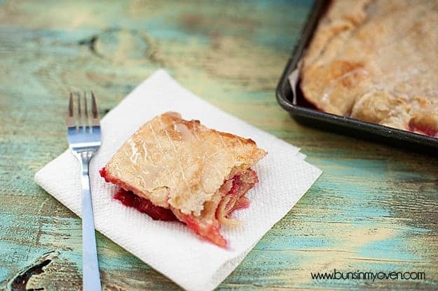 A serving of slab pie on a folded paper towel.