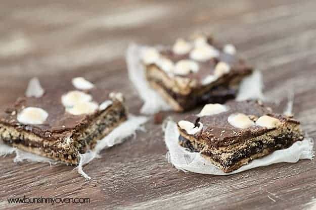 Three smores brownies on a table 