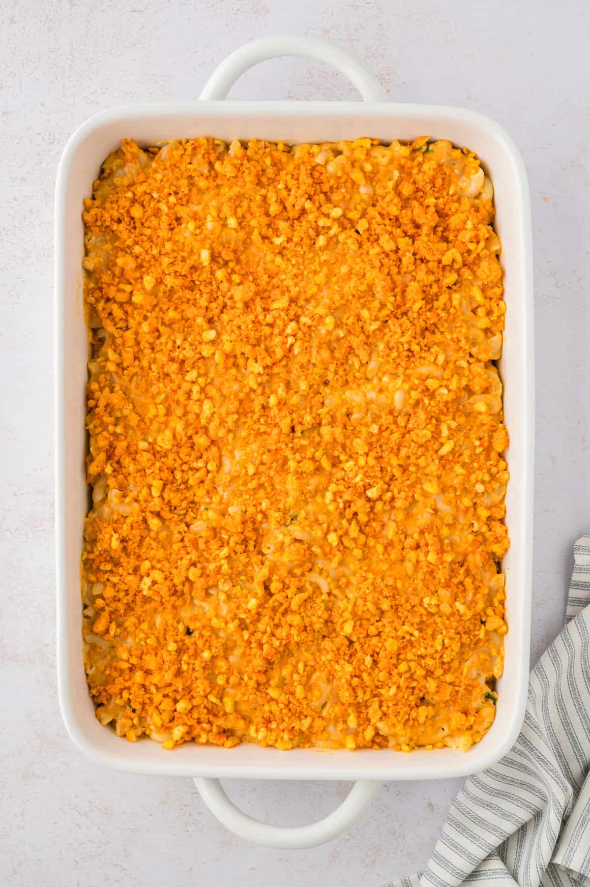 Baked macaroni and cheese topped with crushed Cheetos.