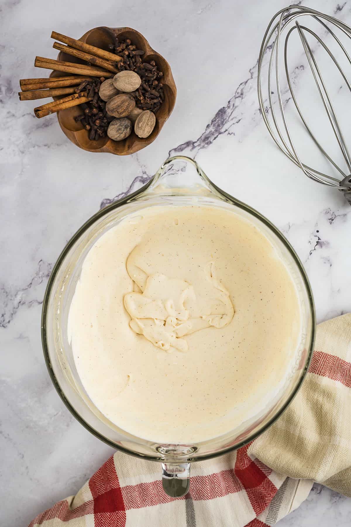 Pumpkin ice cream in mixing bowl.