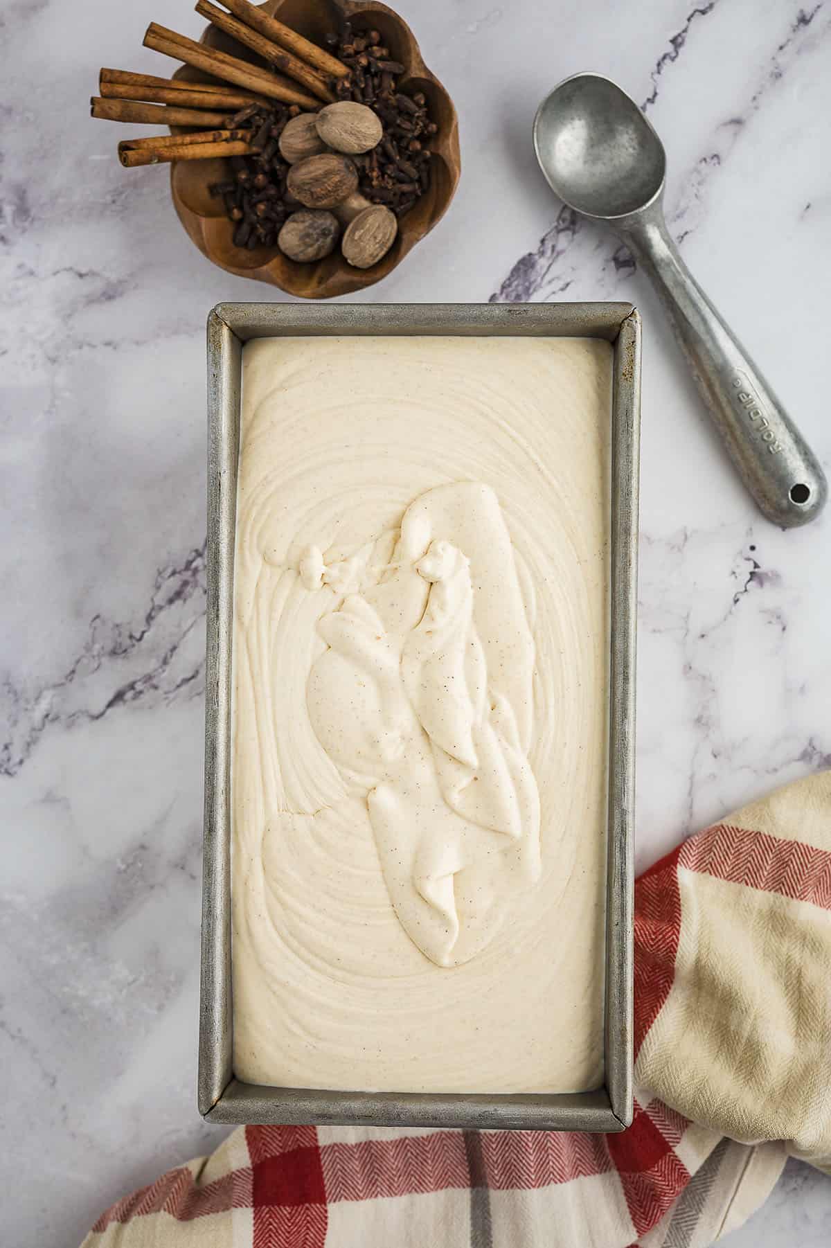 Pumpkin ice cream in metal tin.