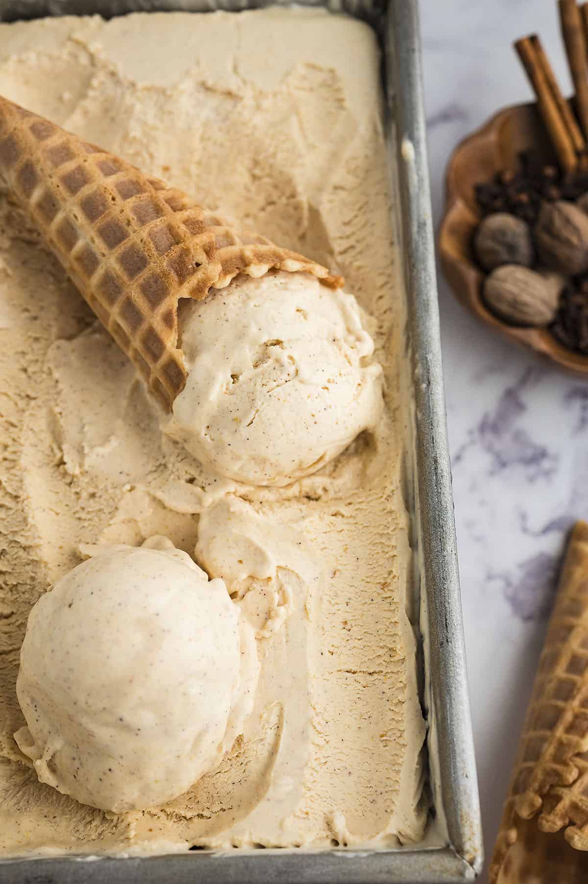 Pumpkin ice cream in metal loaf pan.