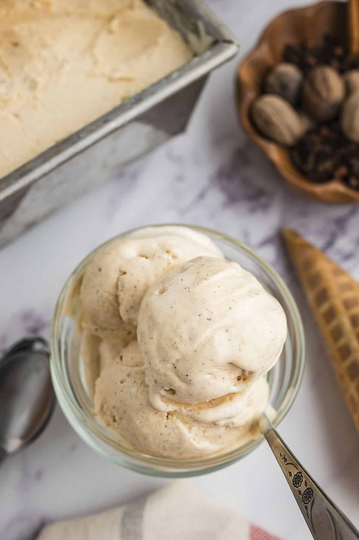 Pumpkin pie ie cream in small dish.