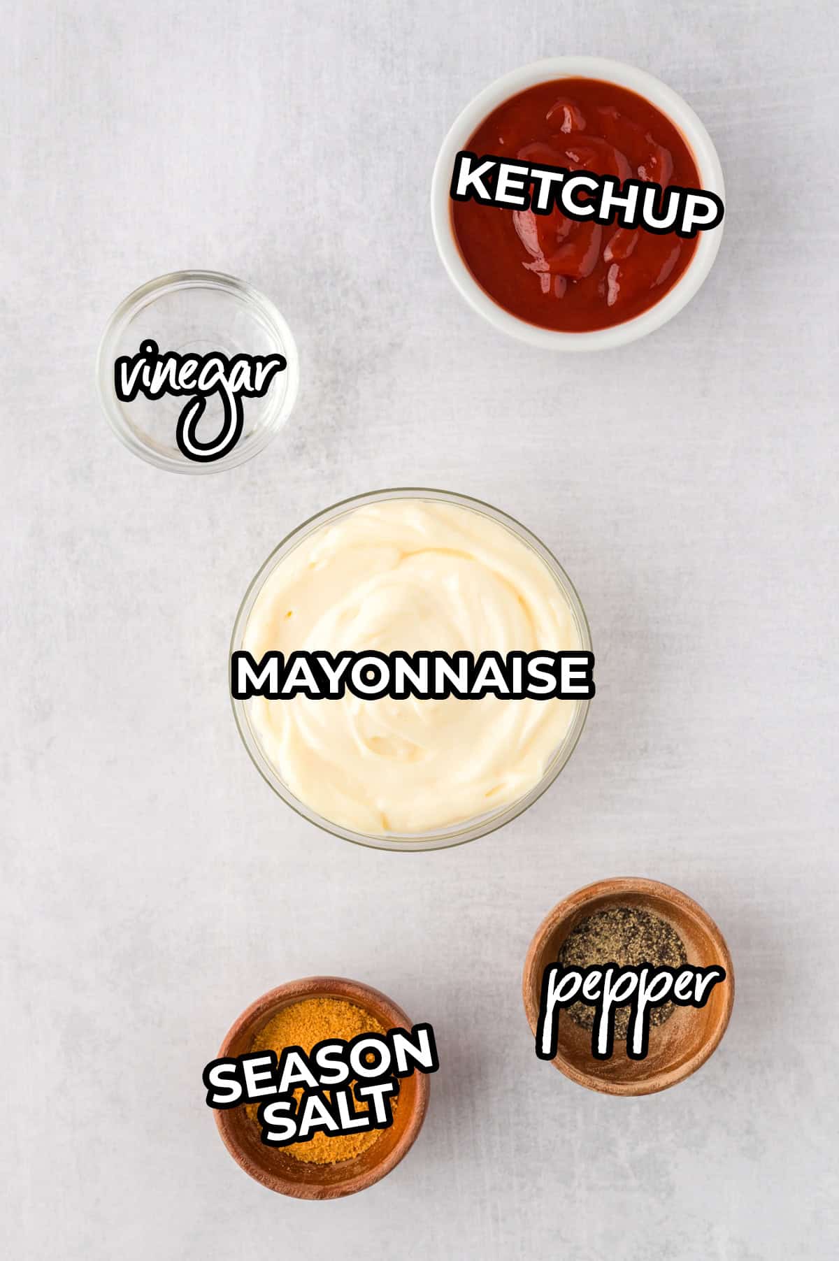 Ingredients for fry sauce in small dishes on counter.