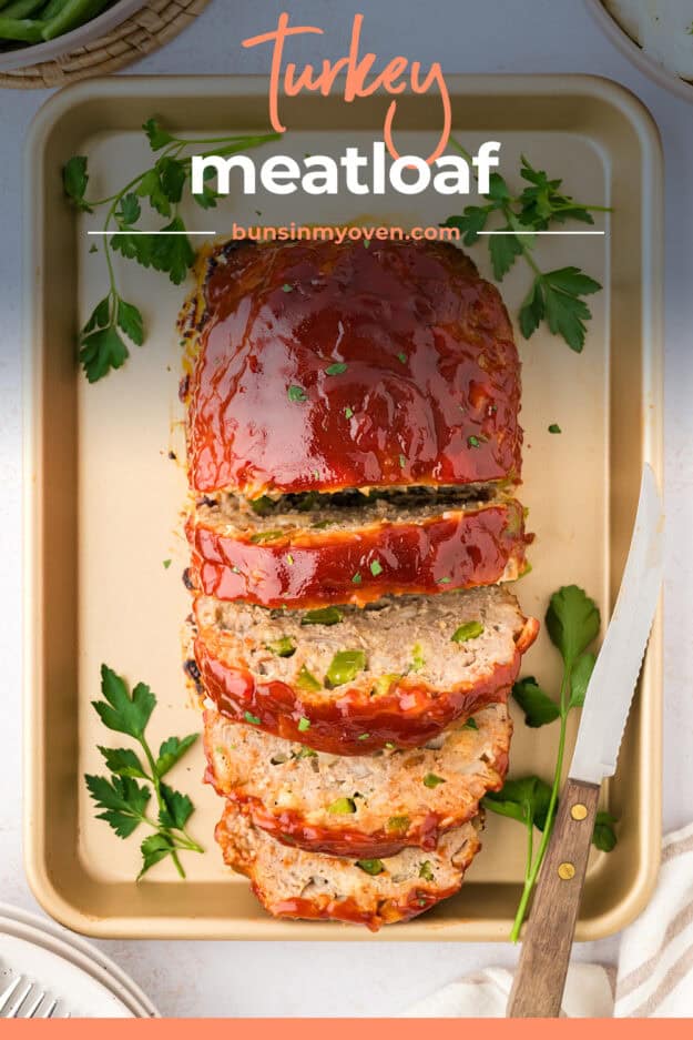 Sliced turkey meatloaf on sheet pan.