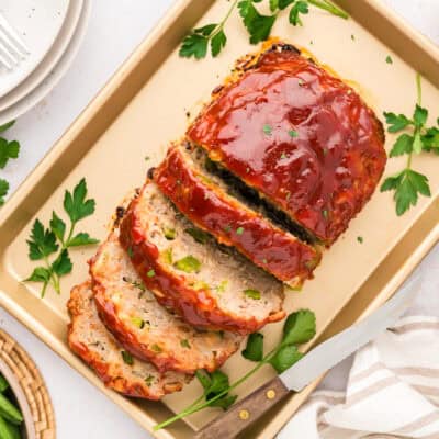 sliced turkey meatloaf on pan.