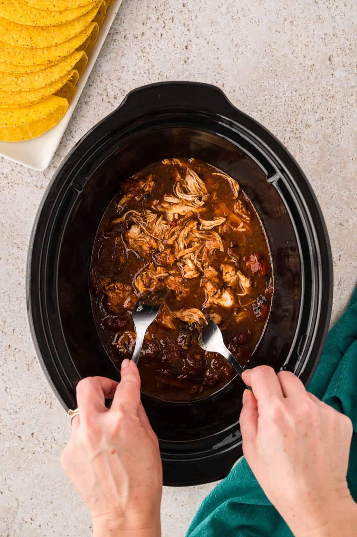 Shredded chicken in crockpot.