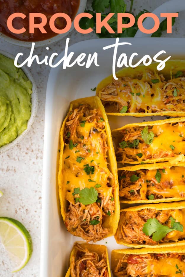 Crockpot chicken tacos in baking dish.