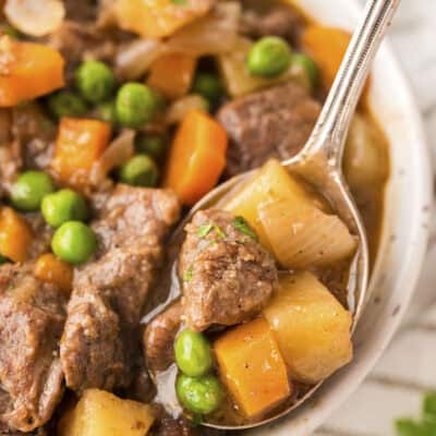 Bowl full of beef stew from crockpot.