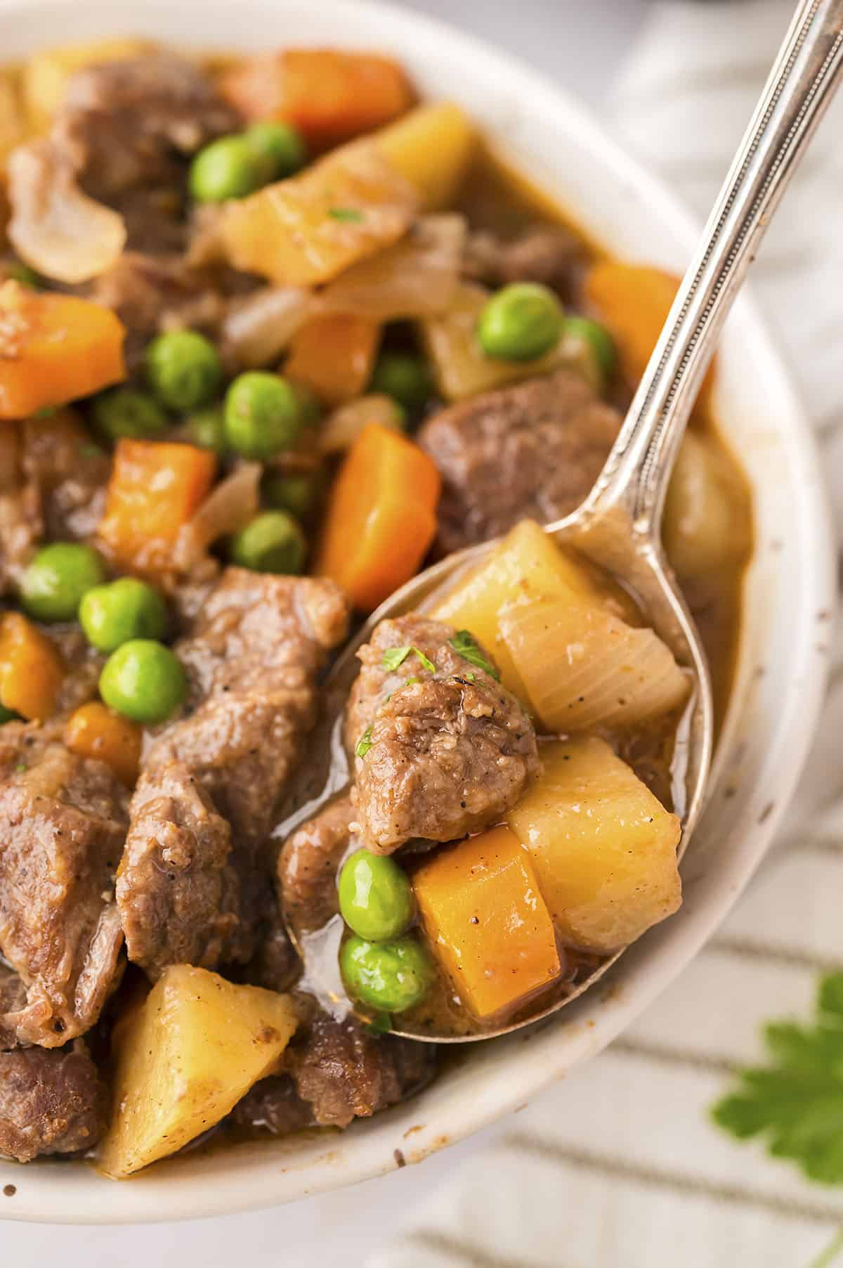 Bowl full of beef stew from crockpot.