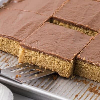 Peanut butter sheet cake on spatula.