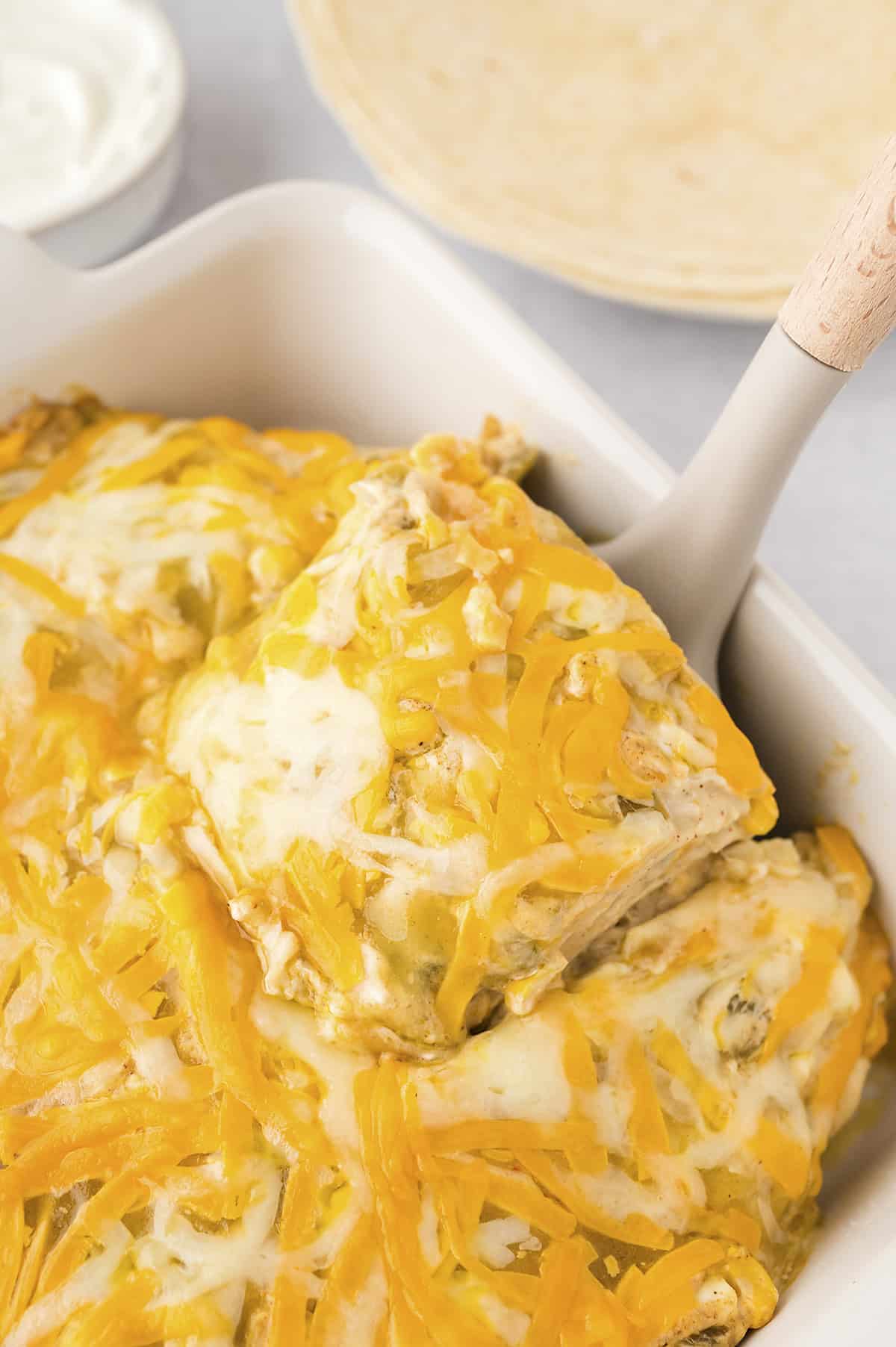 Baked chicken enchilada casserole recipe in pan.