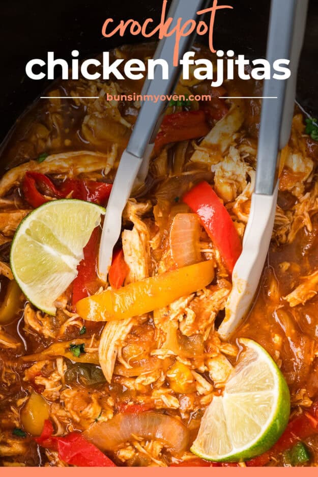 Crock pot chicken fajitas in crock pot with tongs.