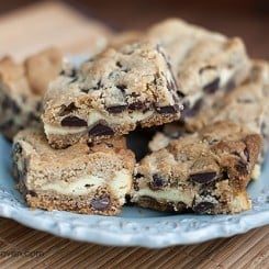 Chocolate Chip Cookie Cheesecake Bars from bunsinmyoven.com