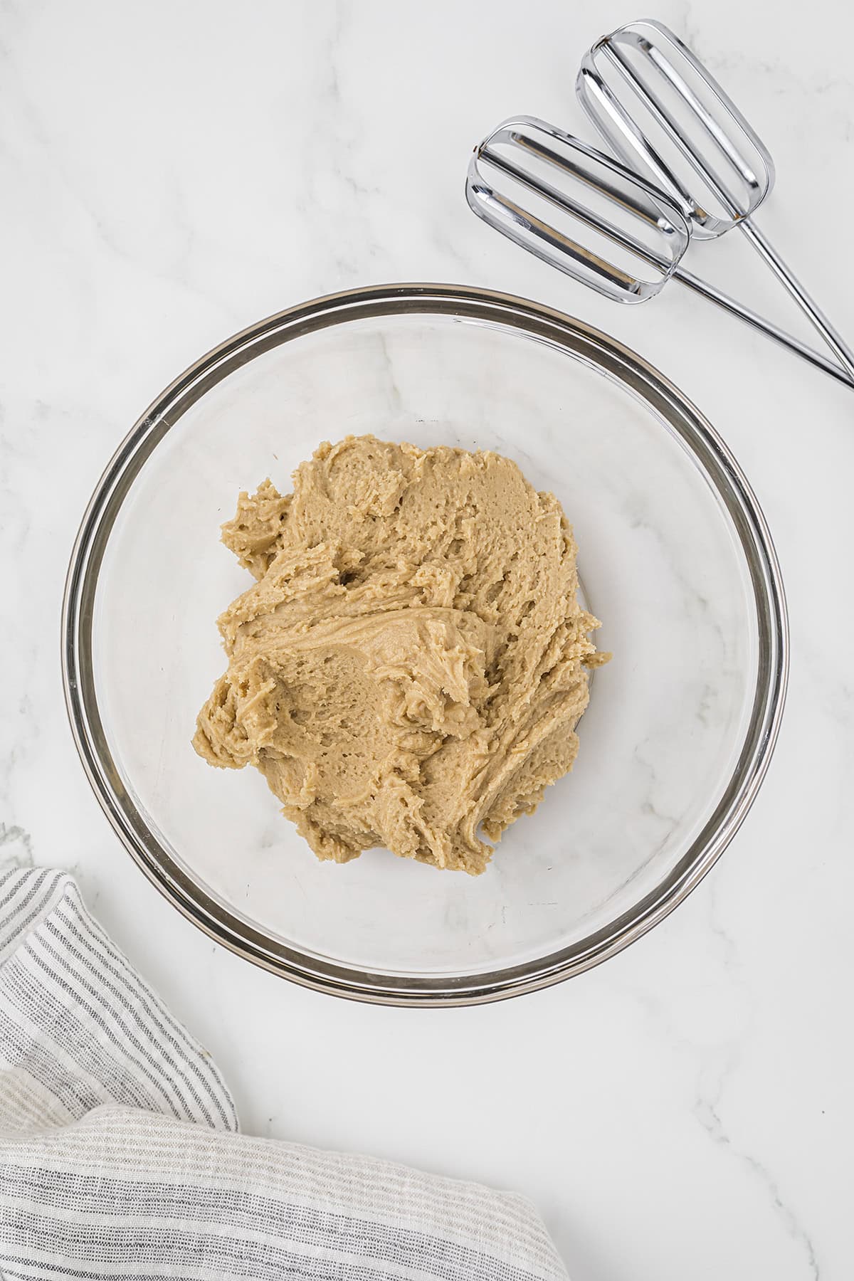 Cookie dough in mixing bowl.