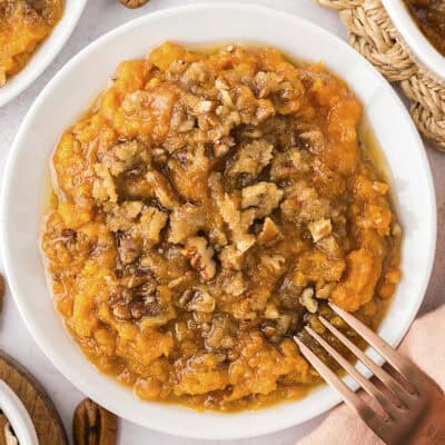 Plate full of sweet potato casserole with canned yams.