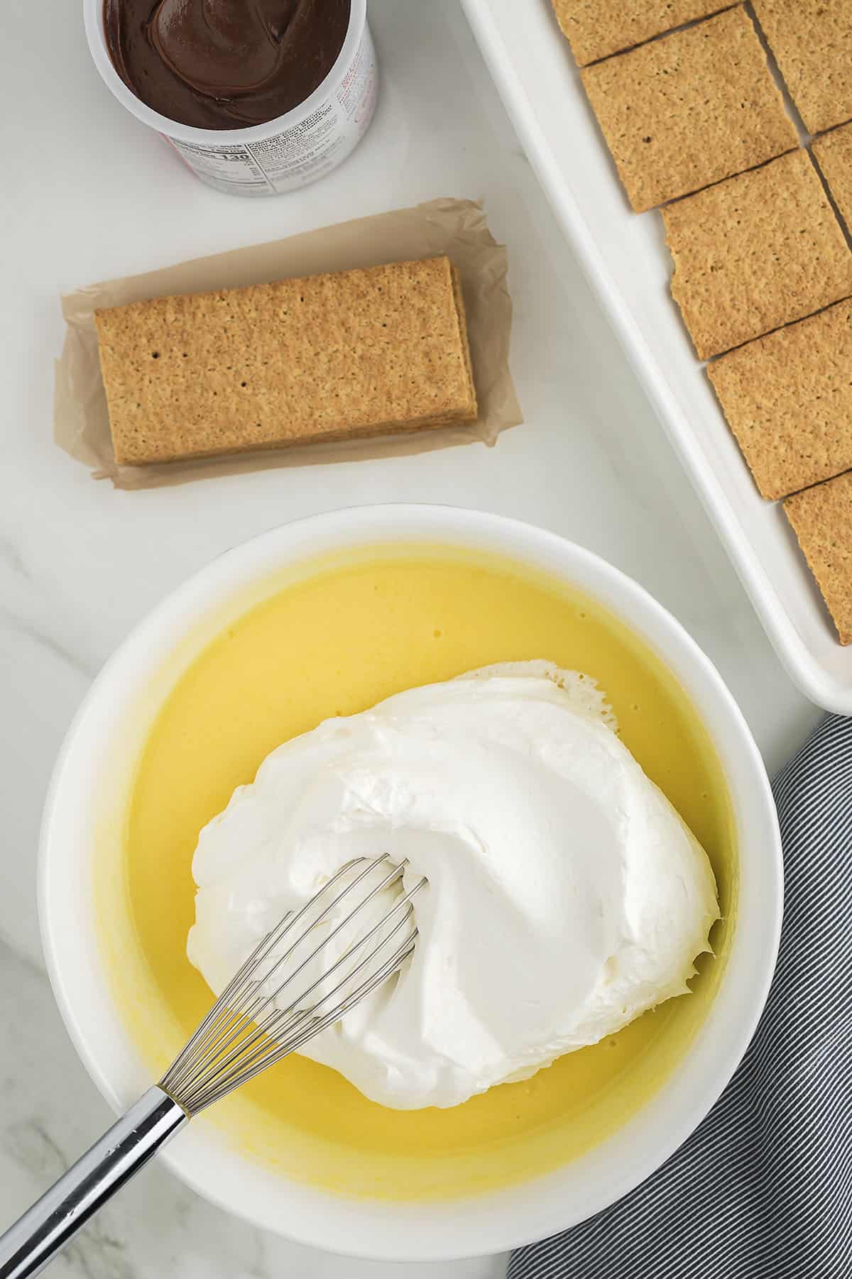 Pudding and Cool Whip in mixing bowl.