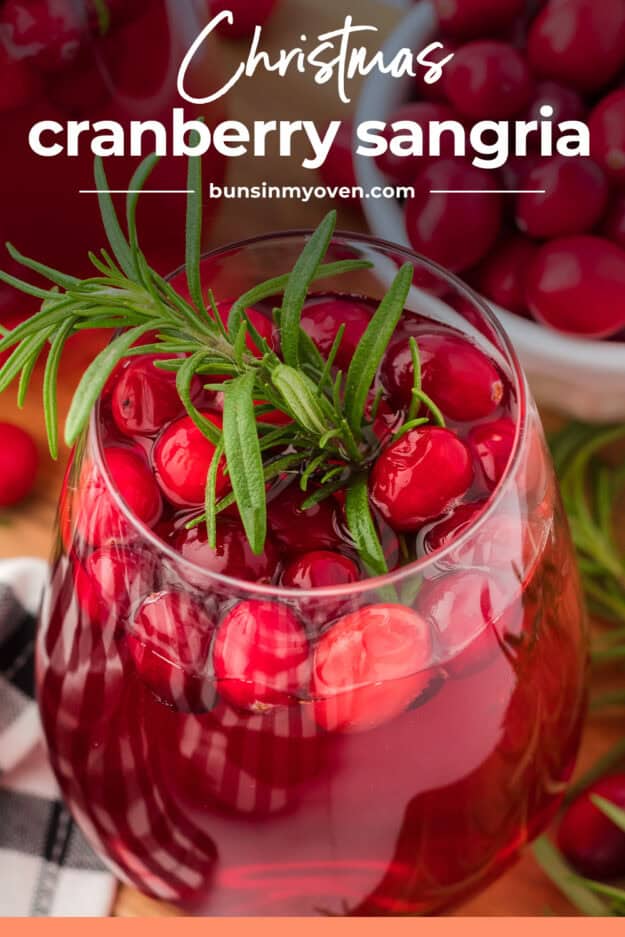 Sangria full of cranberries and rosemary for Christmas.