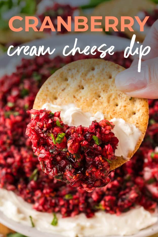 Cracker topped with cranberry salsa and cream cheese.