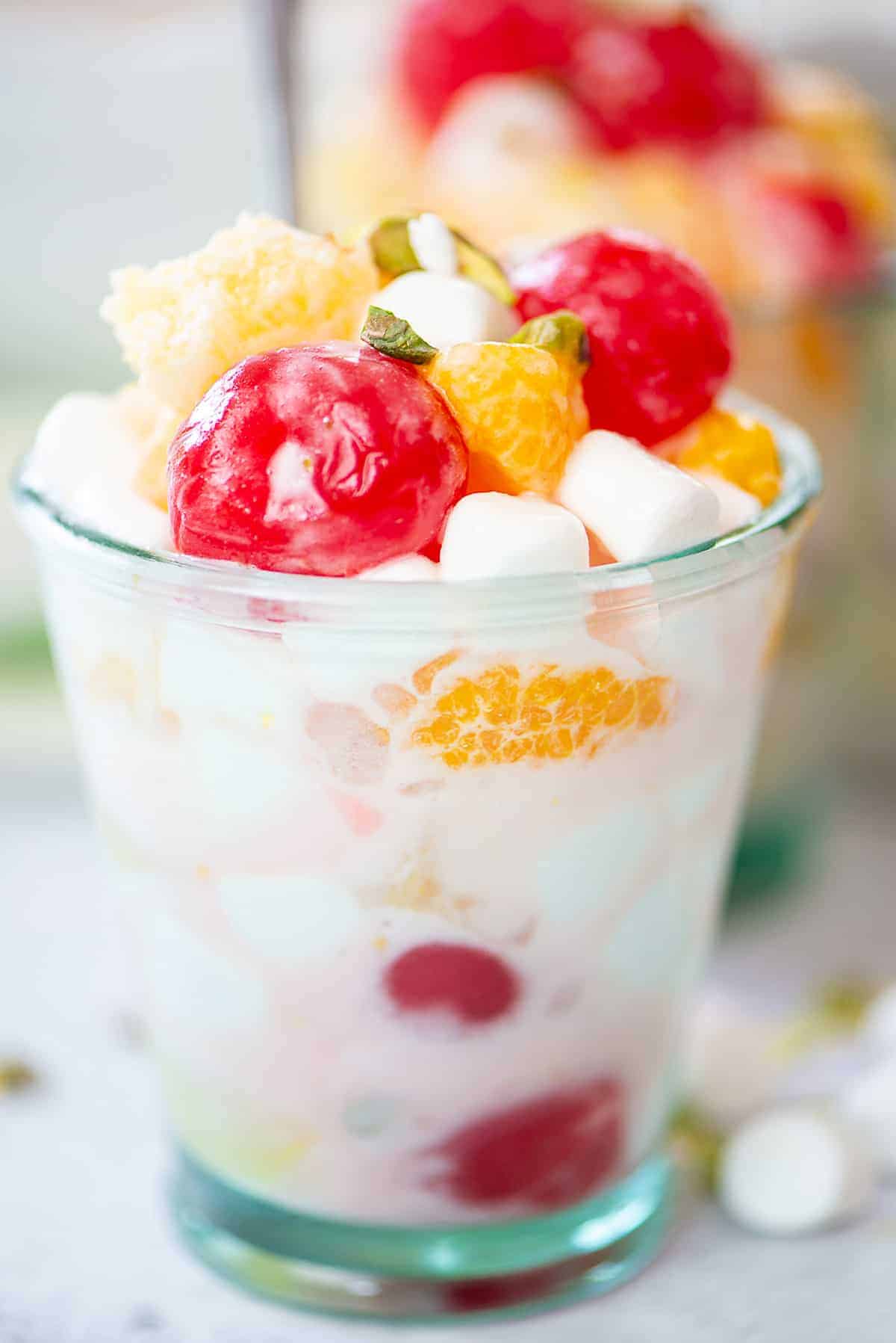 ambrosia salad in small glass.