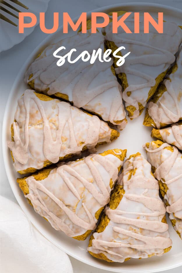 Pumpkin scones on white plate.