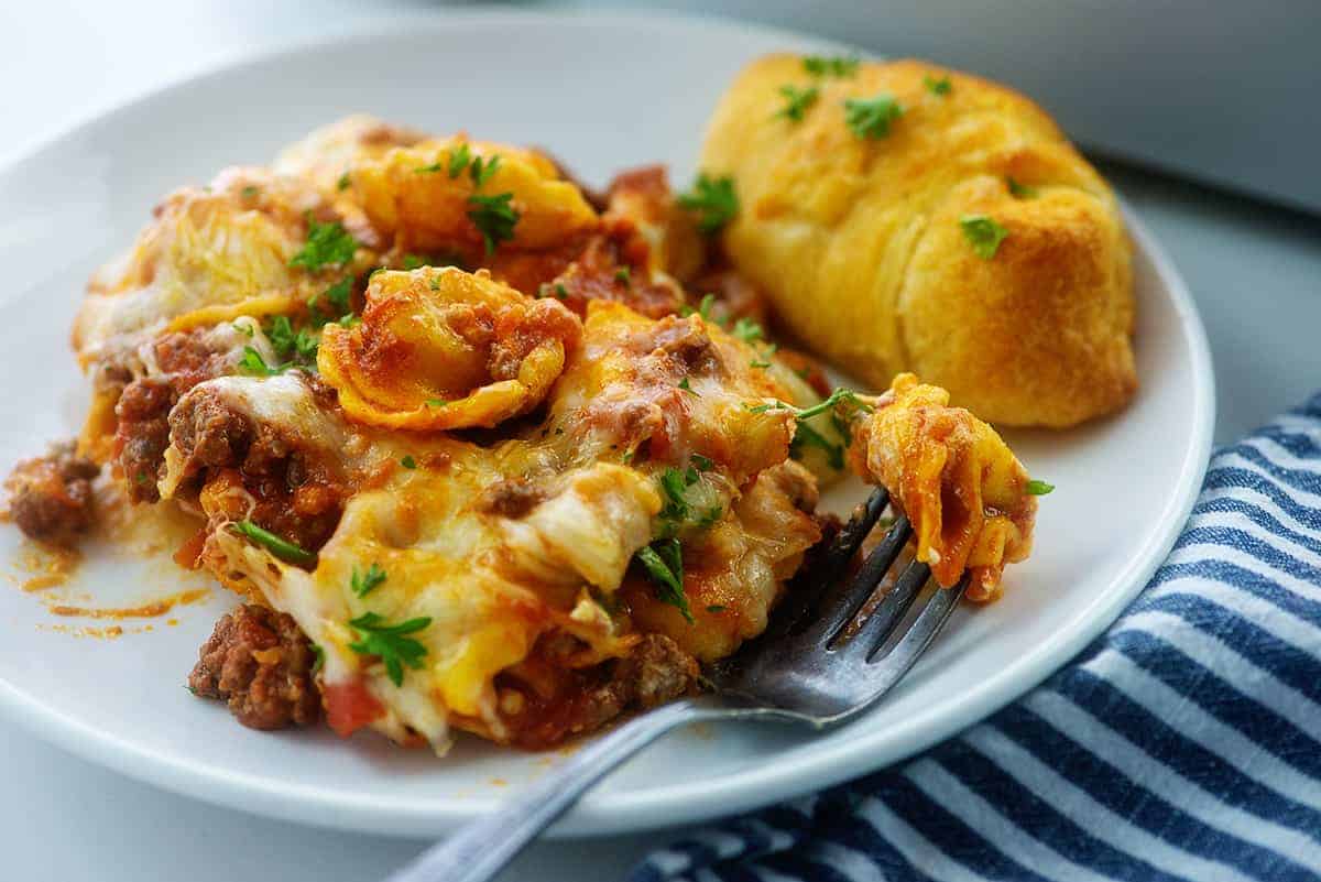 cheese tortellini casserole on white plate