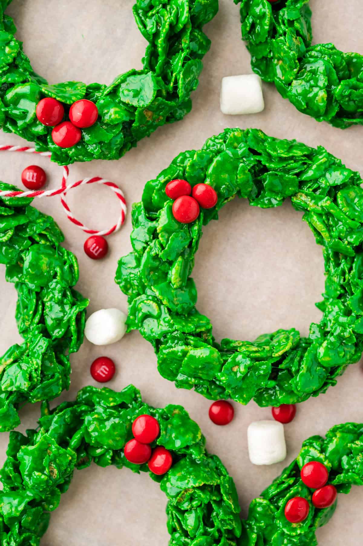 Corn flake wreaths on parchment paper.