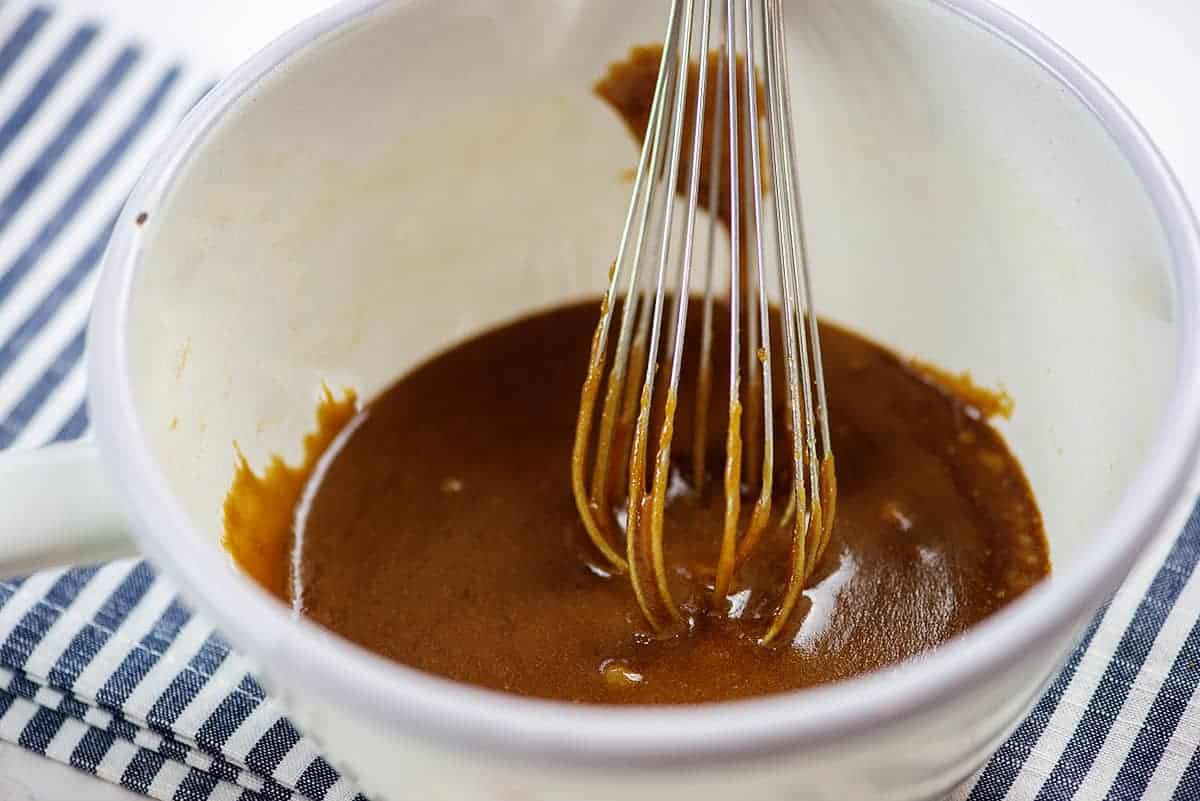 white pan full of homemade caramel sauce.