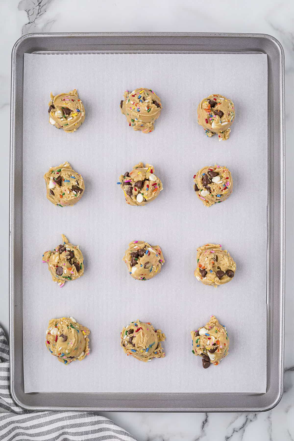 Cookie dough on baking sheet.