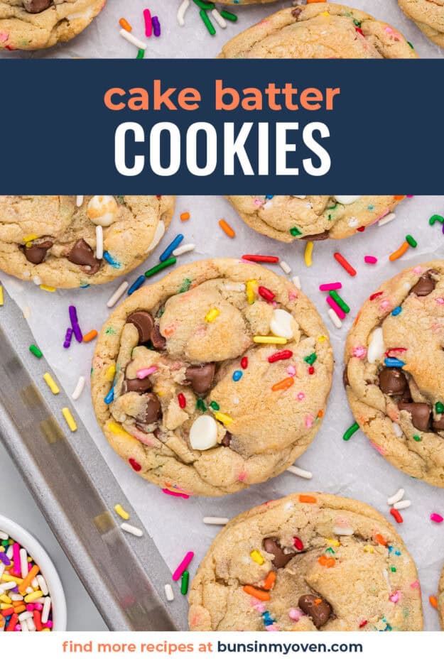 Cake batter cookies with sprinkles on baking sheet.