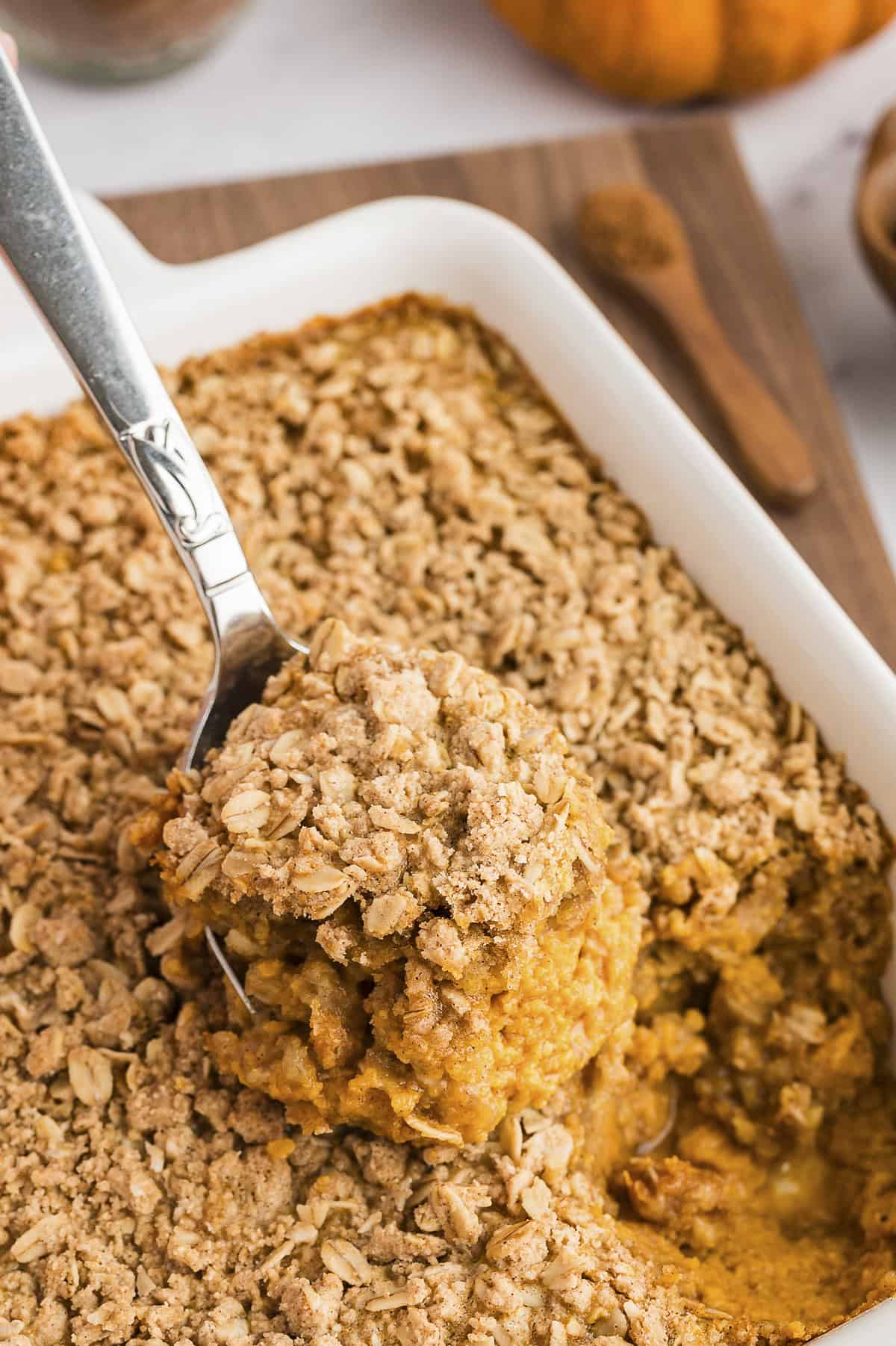 Pumpkin crisp in baking dish.