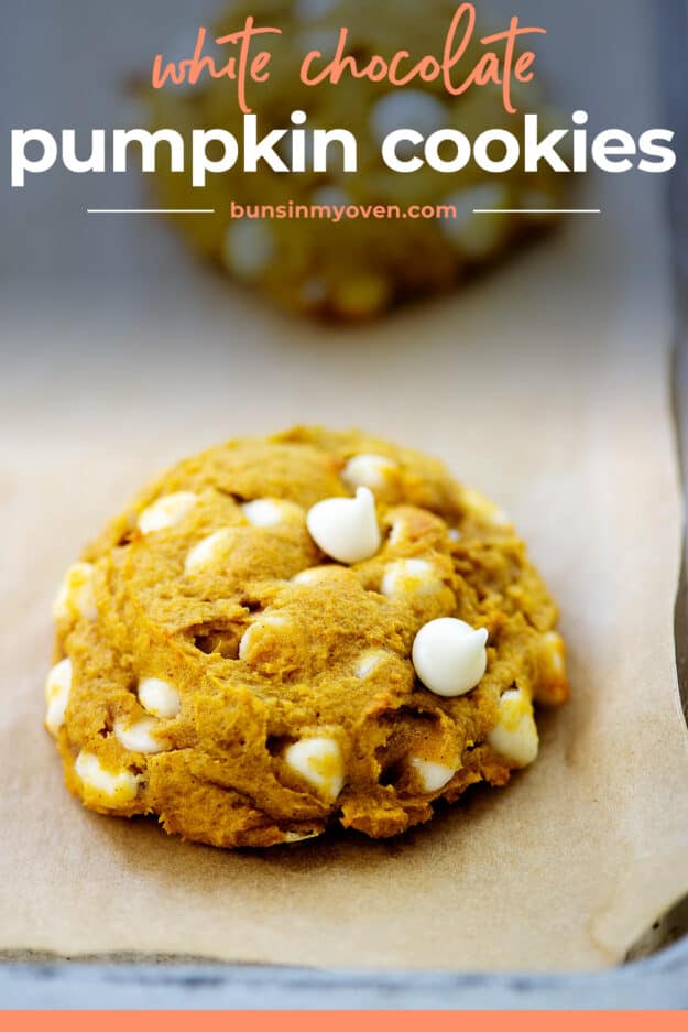 Pumpkin white chocolate cookies on baking sheet.