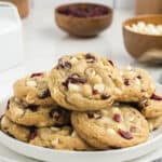 Plate full of cranberry white chocolate chip cookies.