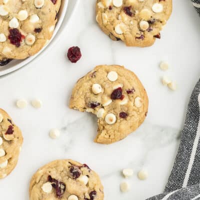 White chocolate cranberry cookies on counter.