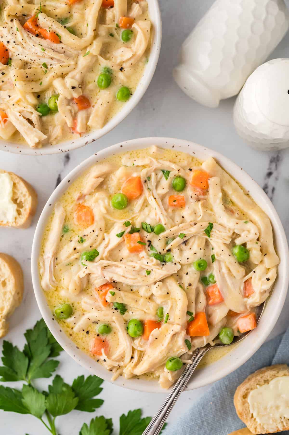 Over head view of creamy chicken and noodles in bowl.