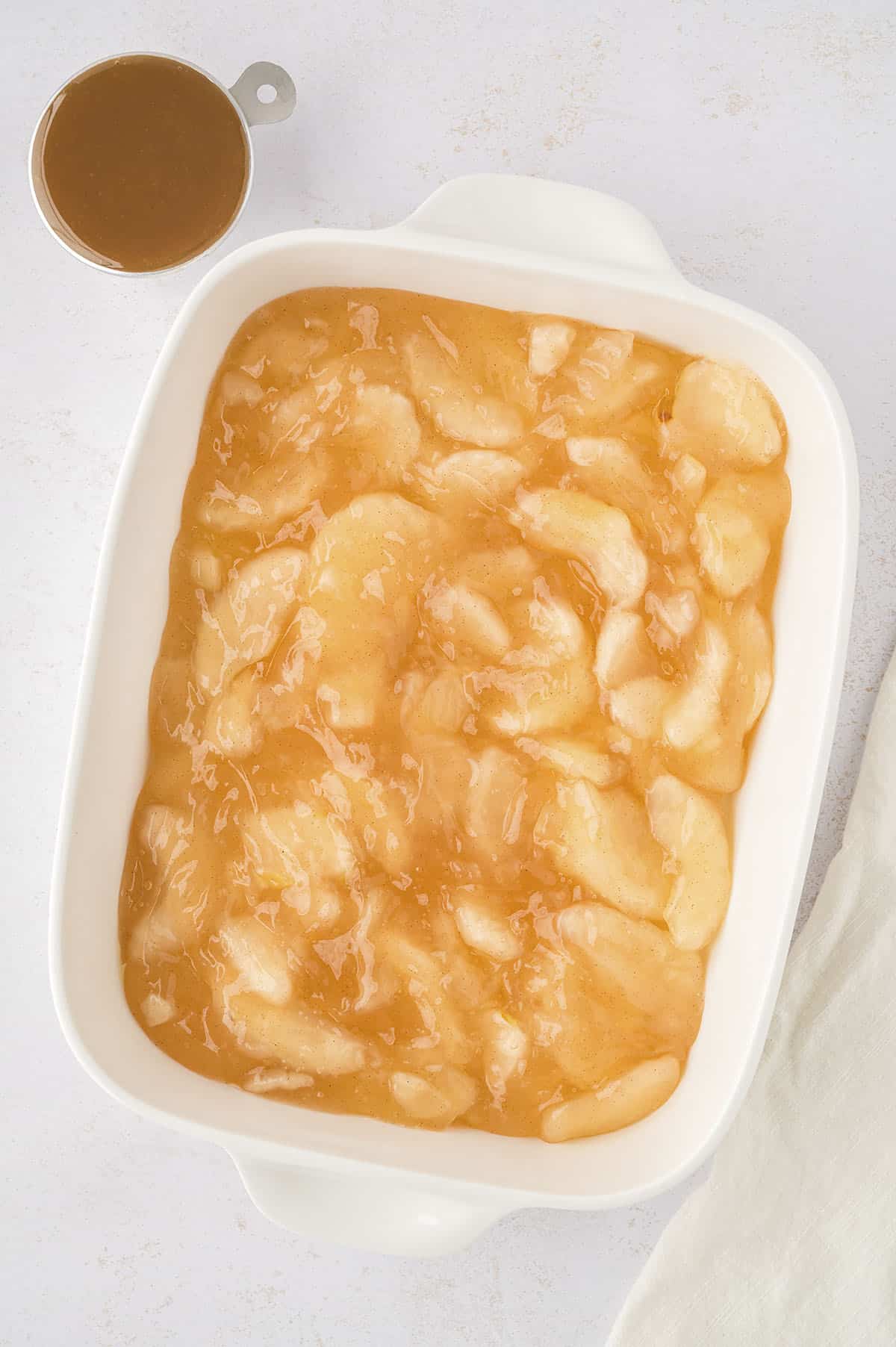 Apple pie filling in 9x13 baking dish.