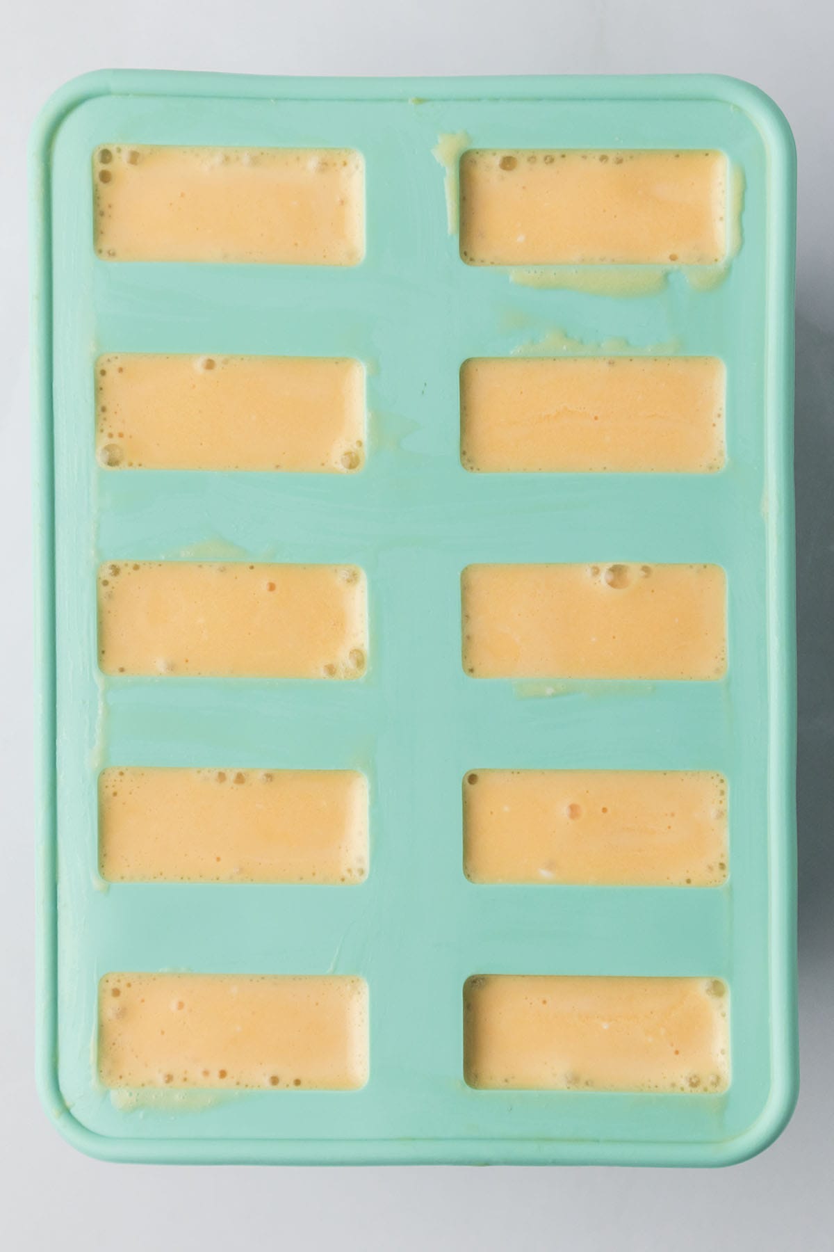 Creamsicles in popsicle mold.