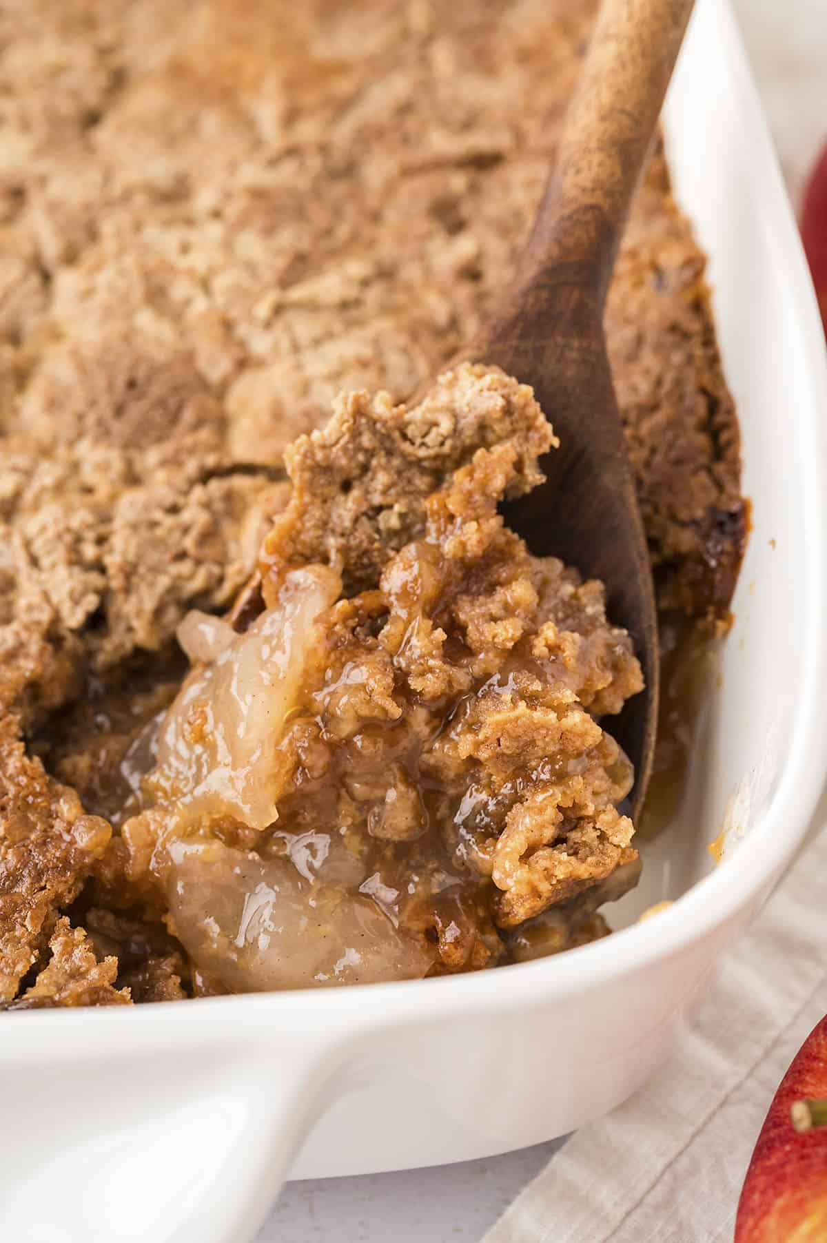 Caramel apple dump cake in pan.